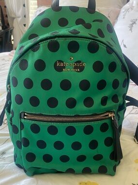 kate spade green and black polka dot mini backpack - interior view
